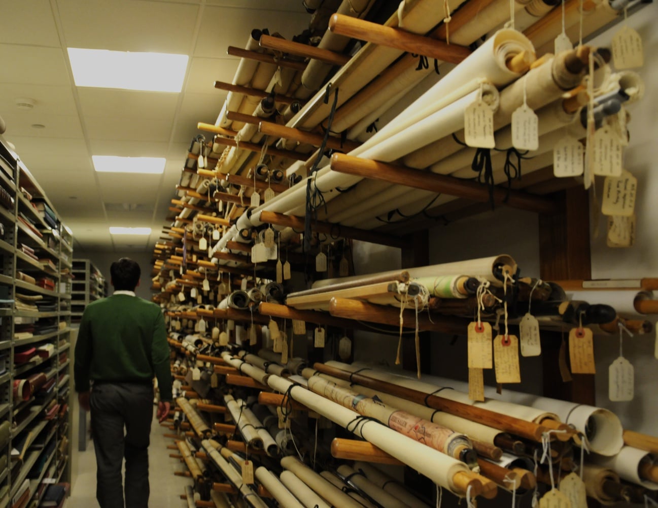 Stores of wall maps held in the Harvard Map Collection in the Pusey Library.