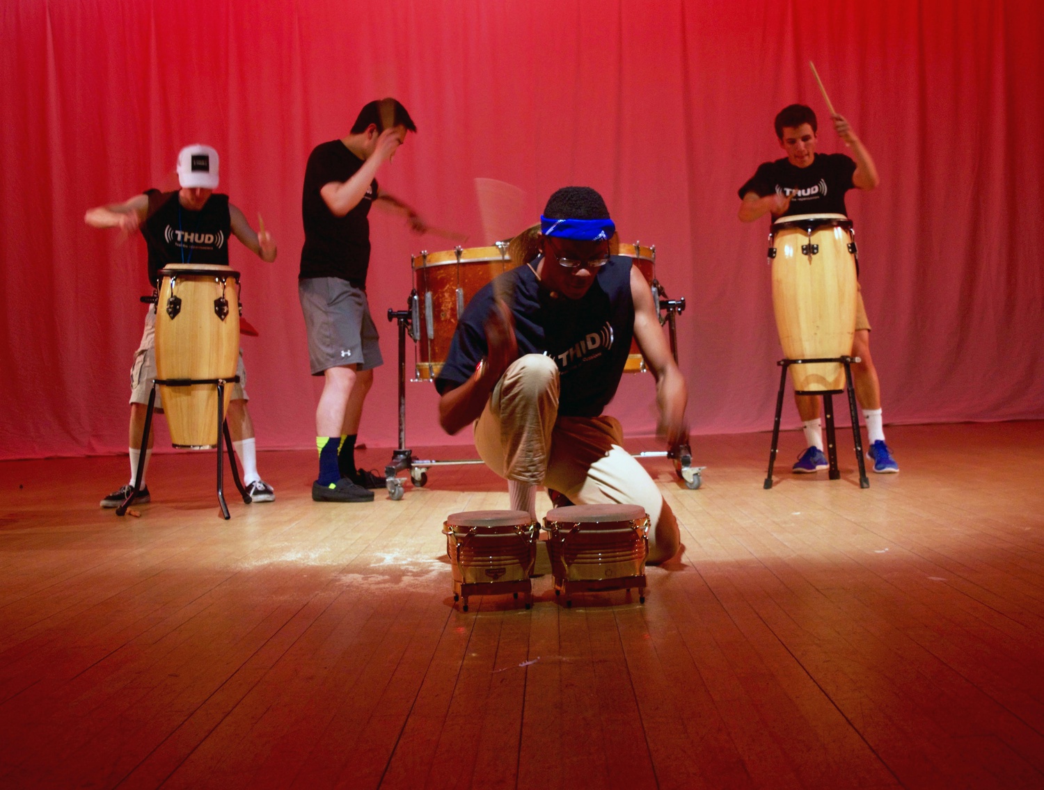 The Harvard Undergraduate Drummers kick off Yardfest weekend with a performance at Lowell Lecture Hall. The performance Friday night centered around a summer camp experience defined by a battle against the proprietary powers of Harvard University.