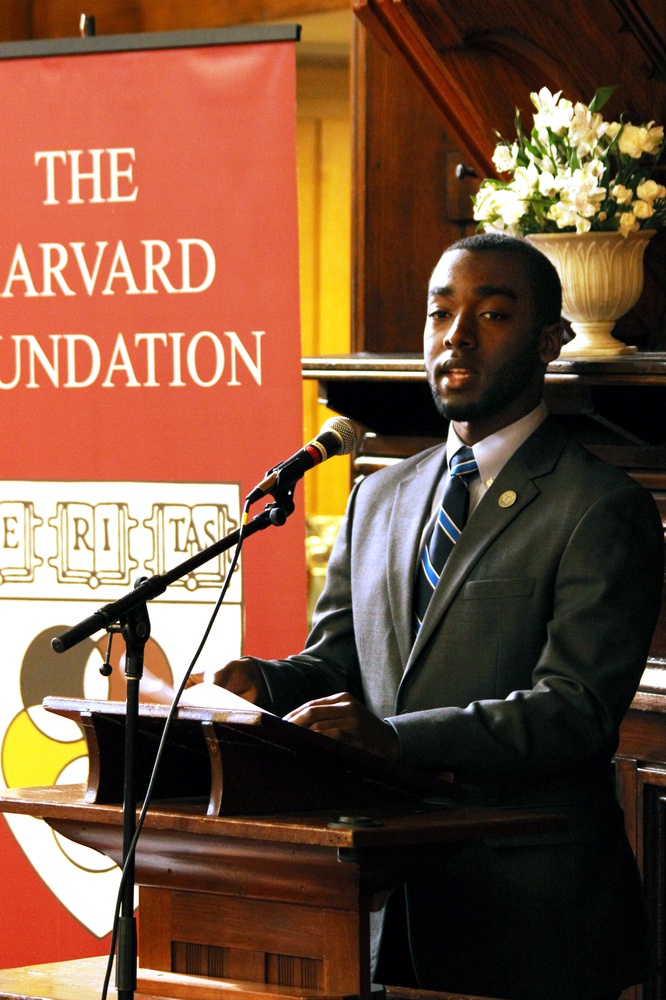 Devontae A. Freeland ’19 speaks at the unveiling of a portrait of Richard T. Greener, class of 1870, in Annenberg Hall Thursday afternoon. 
