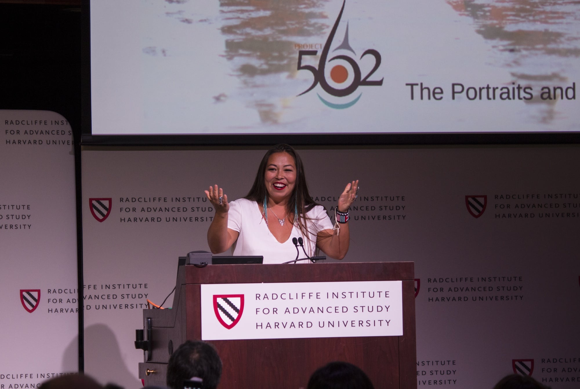 Photographer Matika Wilbur delivers an opening talk for her exhibition "Seeds of Culture: The Portraits and Stories of Native American Women,” at the Radcliffe Institute for Advanced Study Thursday afternoon. The exhibition will run through May 28.