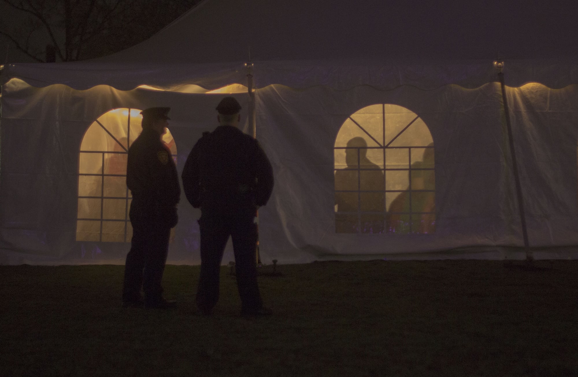 Security officers watch over the Quad Formal Friday. Though HUPD is present around campus all hours of the day, extra security is required for formals and similar events, adding an additional cost to event budgets.