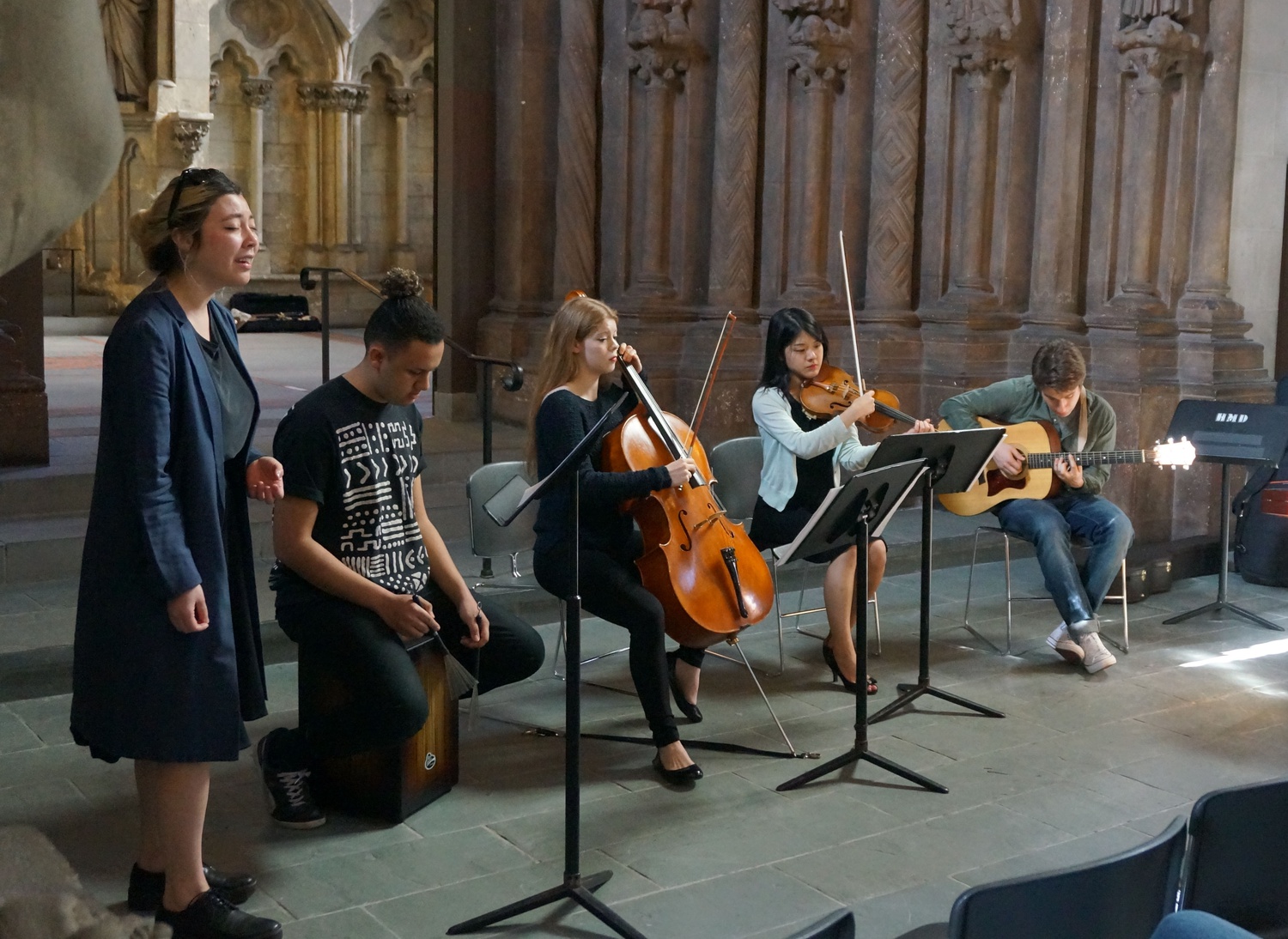 Student musician group Emerge played four indie-music songs with yangqin, strings, and voice in Adolphus Busch Hall Saturday afternoon.