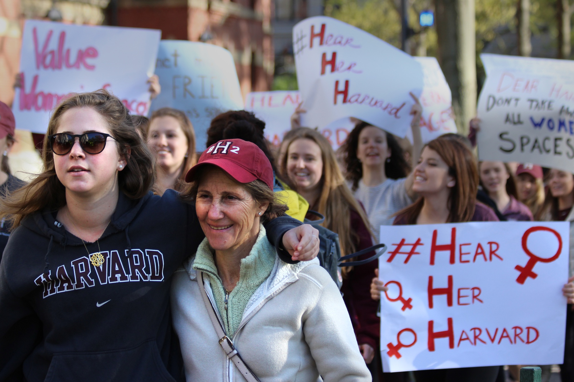 Kappa Kappa Gamma sorority member Elly Duker '19 marched with her mother, Julie Starr-Duker '82, at the #HearHerHarvard protest against newly-announced sanctions against unrecognized single-gender social organizations. More than 200 women rallied in front of Massachusetts Hall in response to the policy, which will bar members of such organizations from holding leadership positions in official clubs and receiving top fellowships.