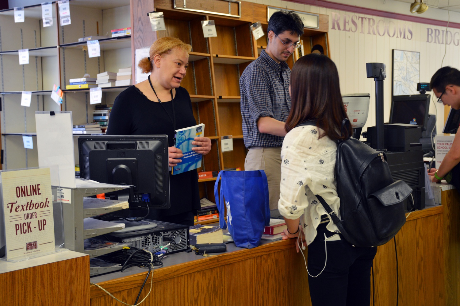 Natalie Cho '17 brings her textbooks to the Harvard Coop to sell them back.  'I didn't get to sell any of them back though," Cho said as she left with her books in hand.
