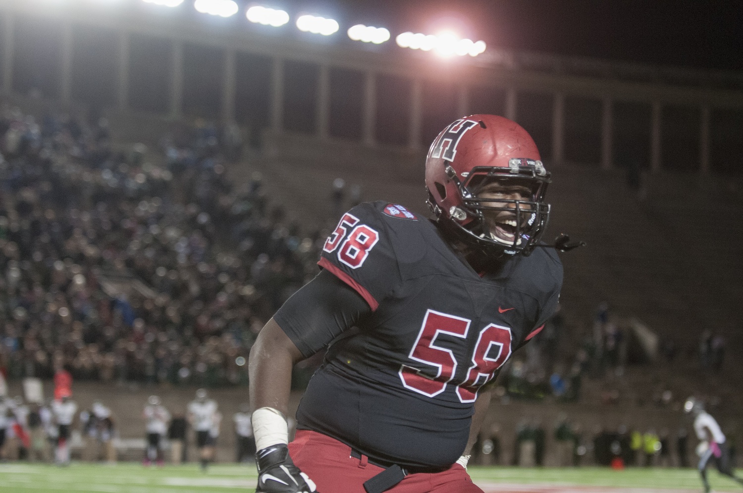 Senior defensive end Denzel Paige celebrated late, but Harvard had nothing to celebrate about in the first half.