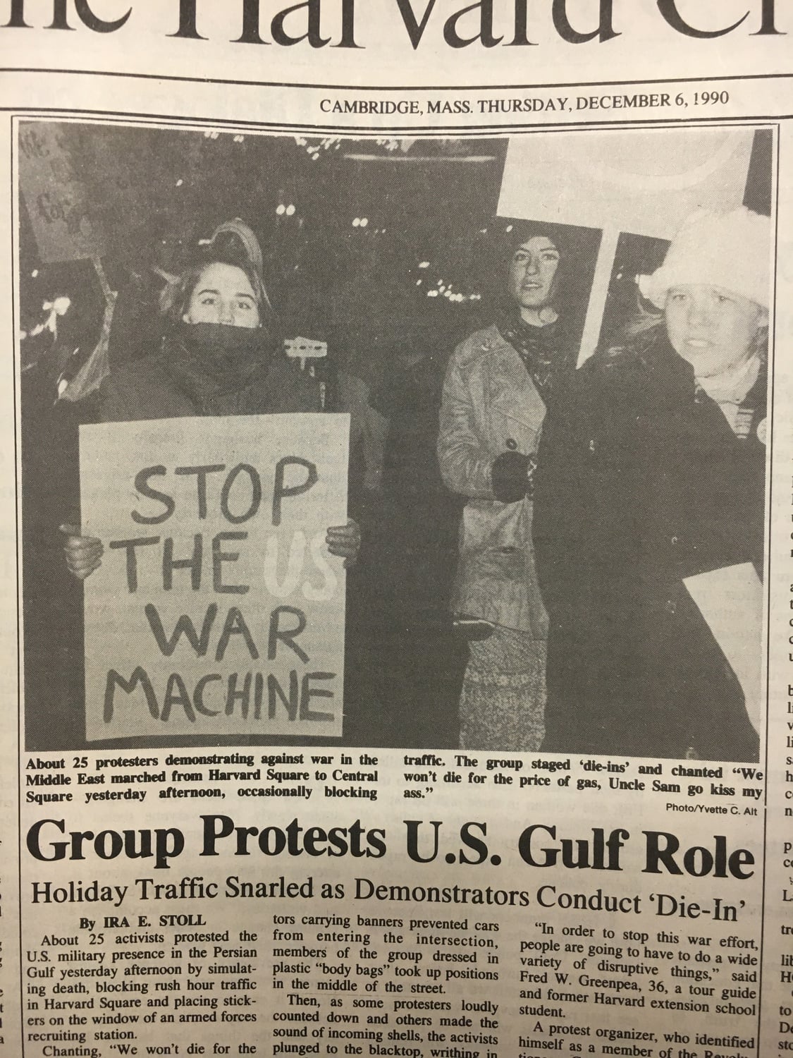 In this photograph from December 1990, about two dozen protesters gathered in Harvard Square, marching and shouting about the U.S. involvement in the Gulf War.