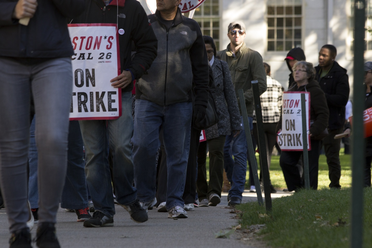 The Harvard University Dining Services strike continued over the weekend, as hundreds of students, staff, and organizers march on Harvard campus. Here, dozens protest outside Mass Hall during Columbus Day weekend.