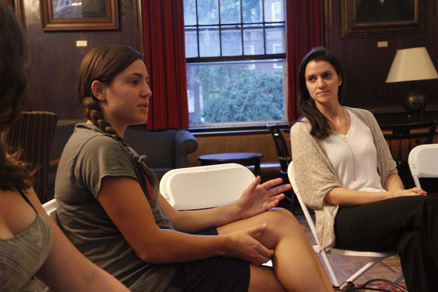 The Student Labor Action Movement hosted a teach-in in Kirkland House on September 21. Lawyer Erin Walczewski (right) began the discussion with background information on labor strikes. Here, a Harvard student poses a question to the group.