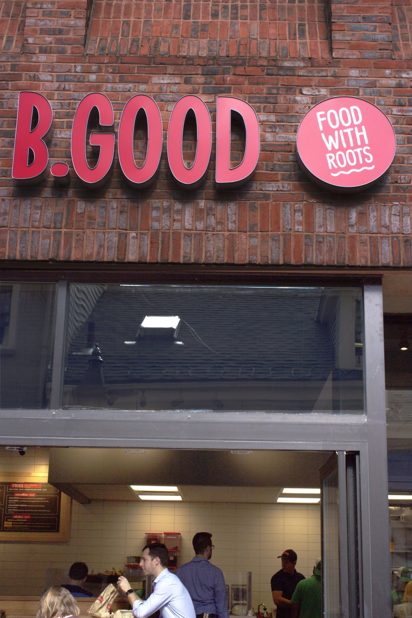 Dozens flocked to eat lunch at b.good Monday afternoon. The restaurant reopened at a new location in Harvard Square last week.