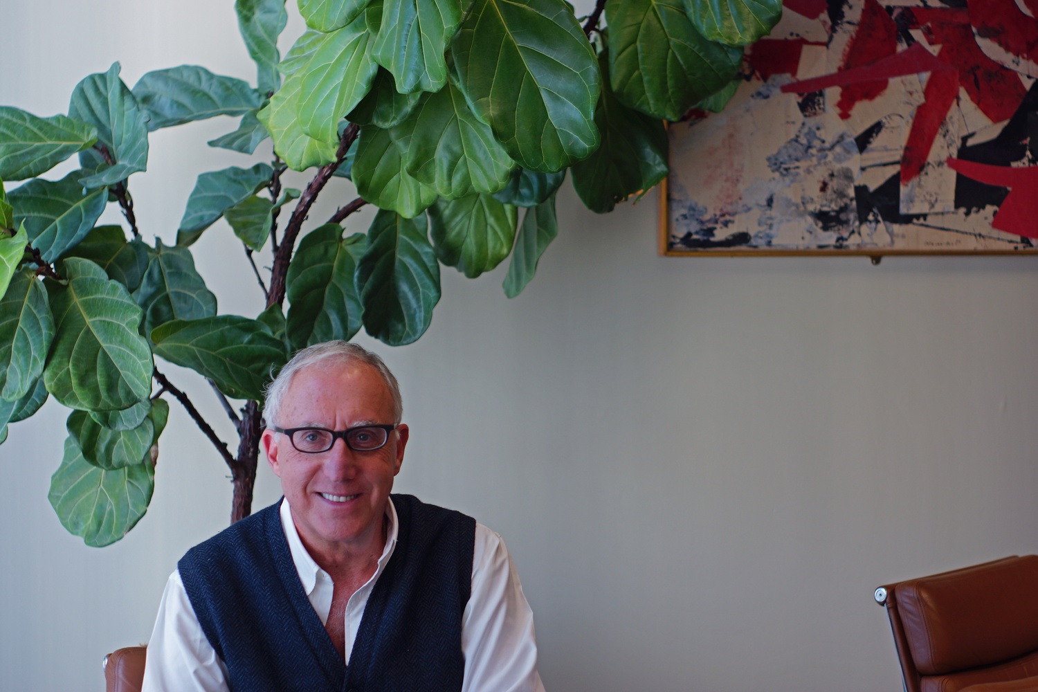 Current head of Harvard's technology office, Isaac Kohlberg, says that his office's "mission [is] all about societal impact." Here, he sits at his own desk.