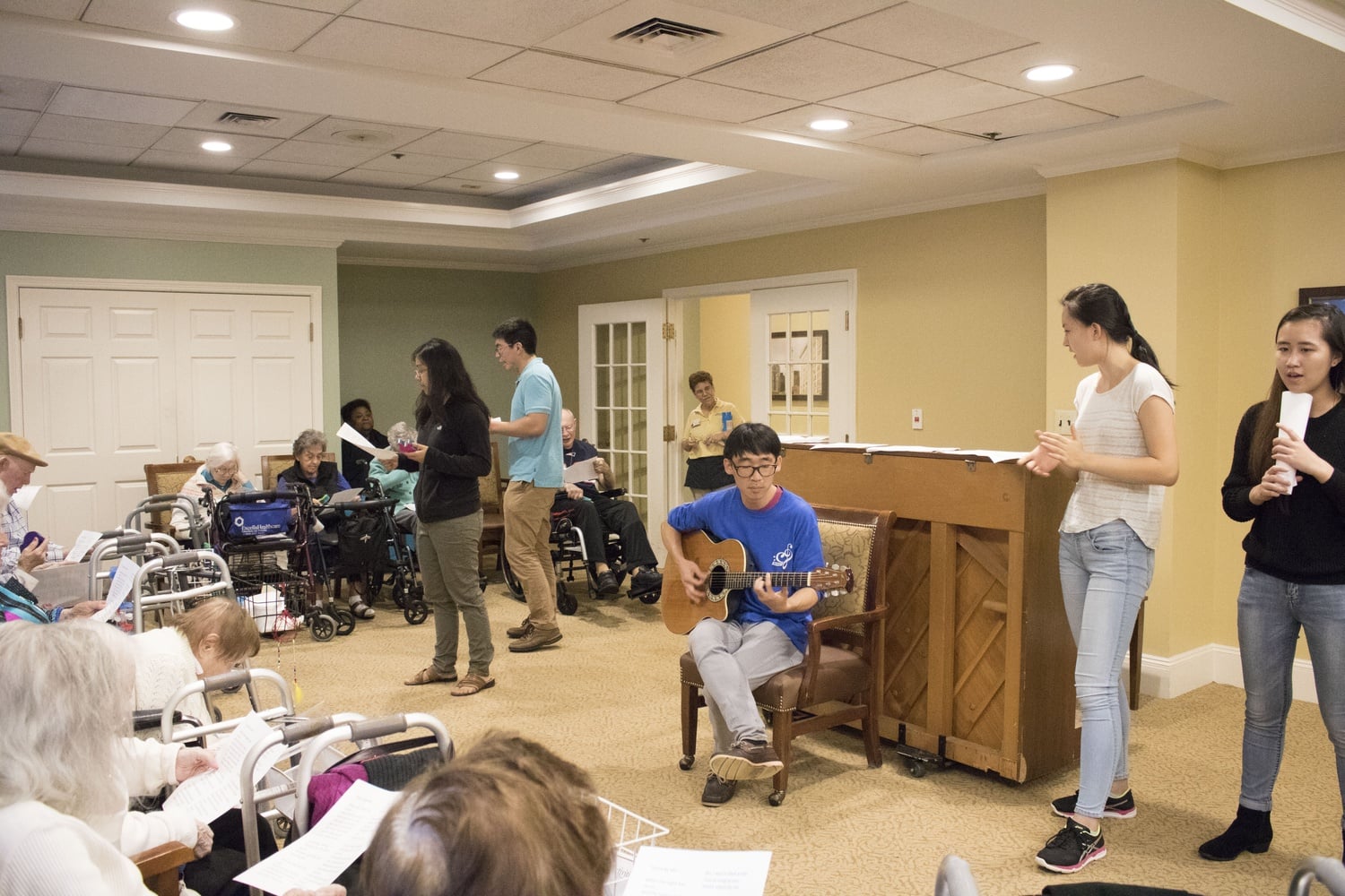 Members of Crooners (a division of MIHNUET) visit the Chestnut Hill nursing home for a group singing activity on October 9. 