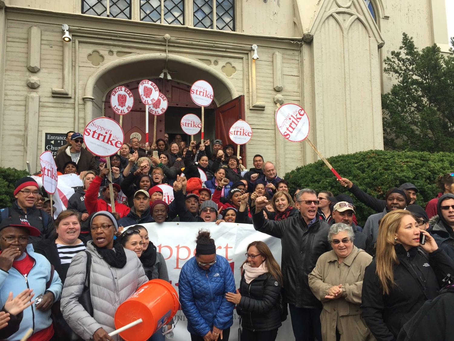 HUDS employees and union members gather at the contract announcement at First Parish Church Wednesday afternoon.
