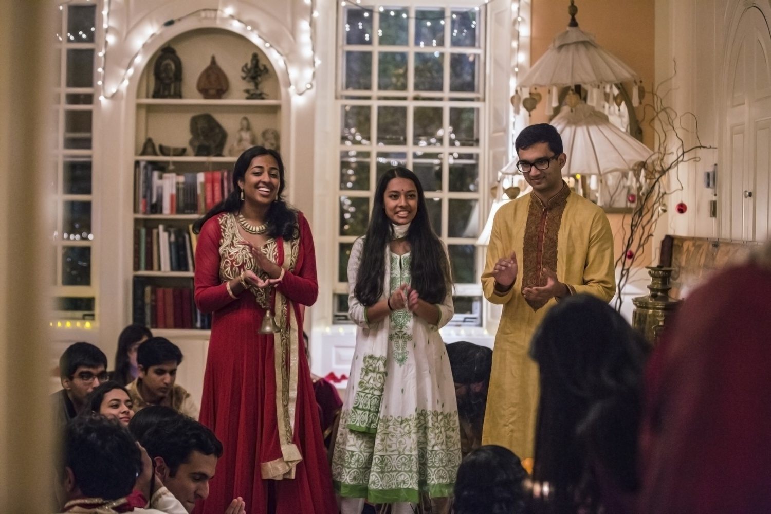 Students of Harvard Dharma lead a pooja in celebration of Diwali, one of the biggest holidays in Hindu culture, on Sunday night in the Lowell Faculty Deans' residence. A traditional Indian dinner followed the ceremony.  