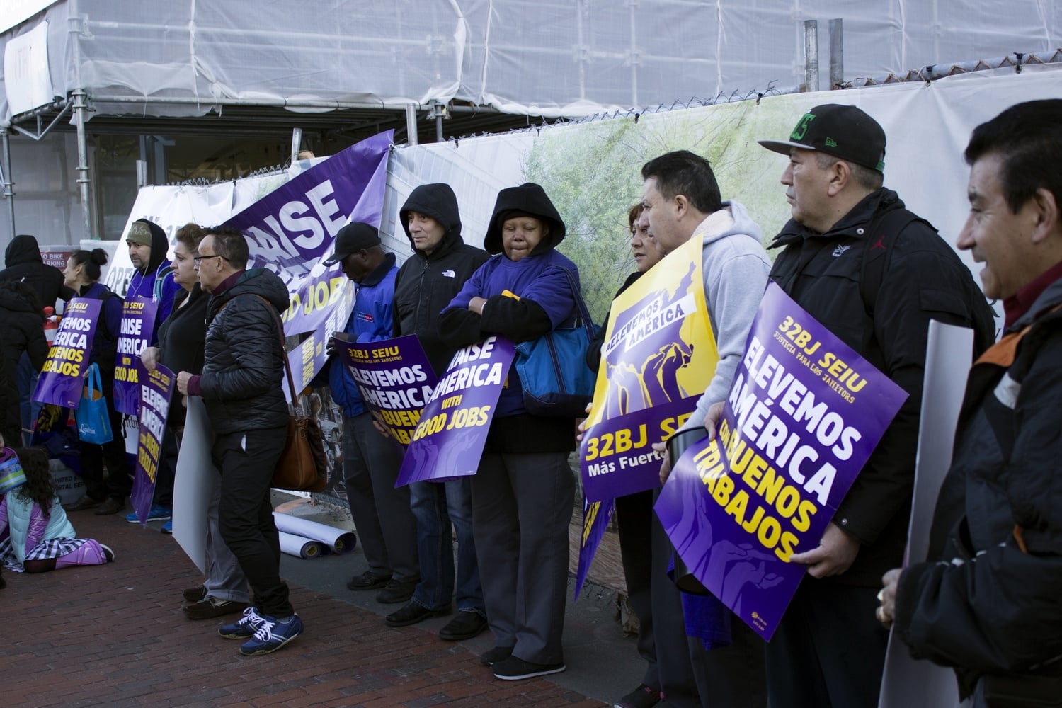 Roughly three dozen Harvard custodial and security workers staged a demonstration for increased health benefits and higher wages outside the Smith Campus Center Monday afternoon. Citing the dining services workers’ strike as inspiration, the workers and 32BJ Service Employees International Union  hope to negotiate an acceptable contract by mid-November.