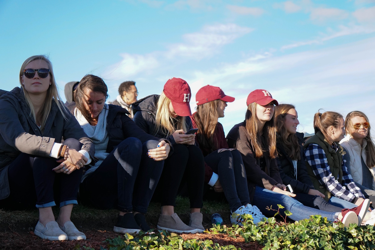 Members of the Women's Lacrosse team watching Saturday's soccer game.