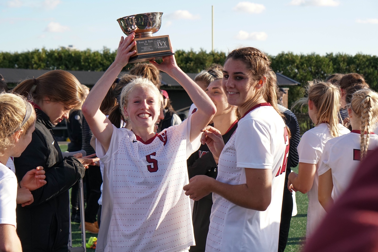 Co-captain Bailey Gary hoists the trophy.
