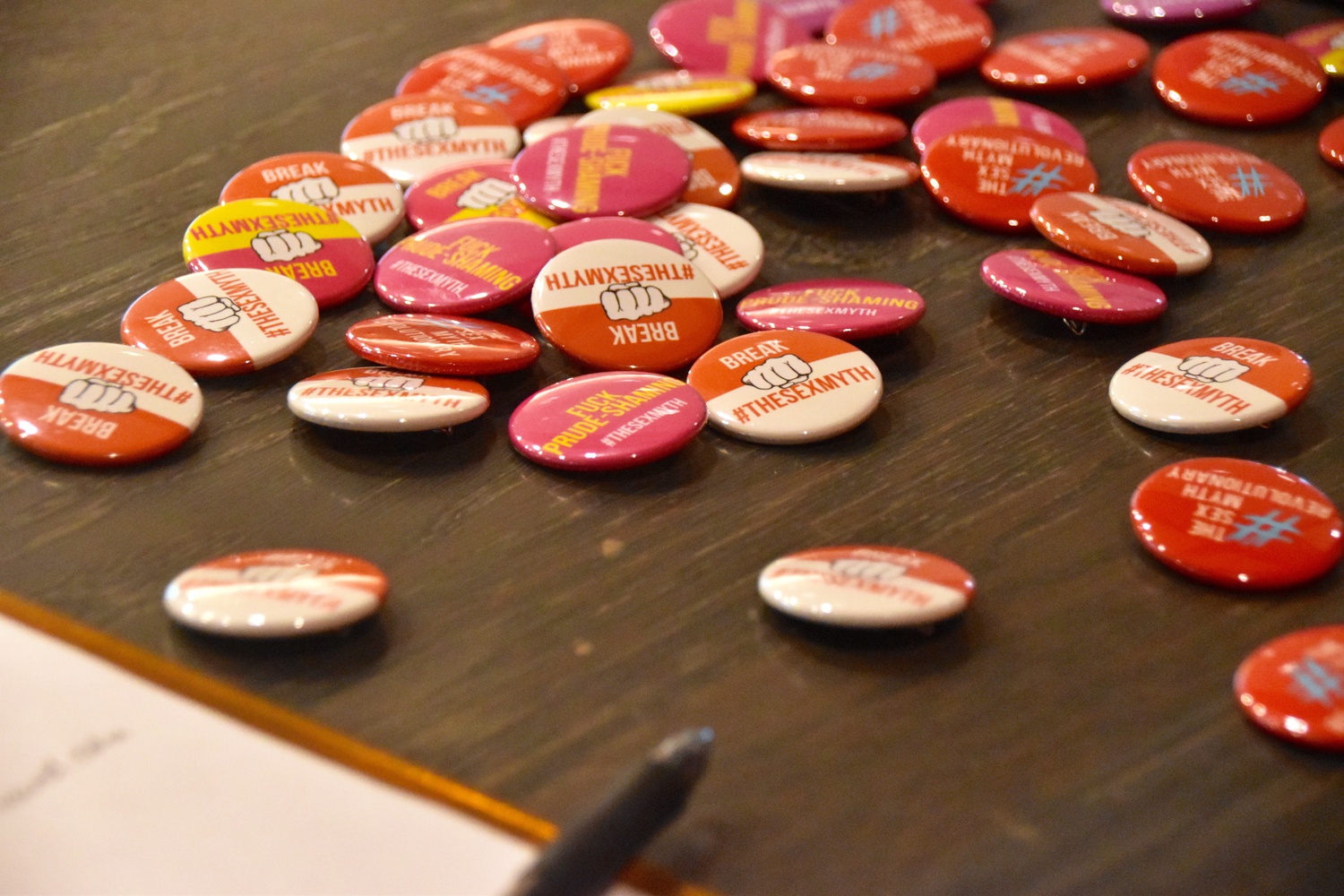 Pins decorated with the message "Break #TheSexMyth" on display at Harvard Sex Week in 2016.