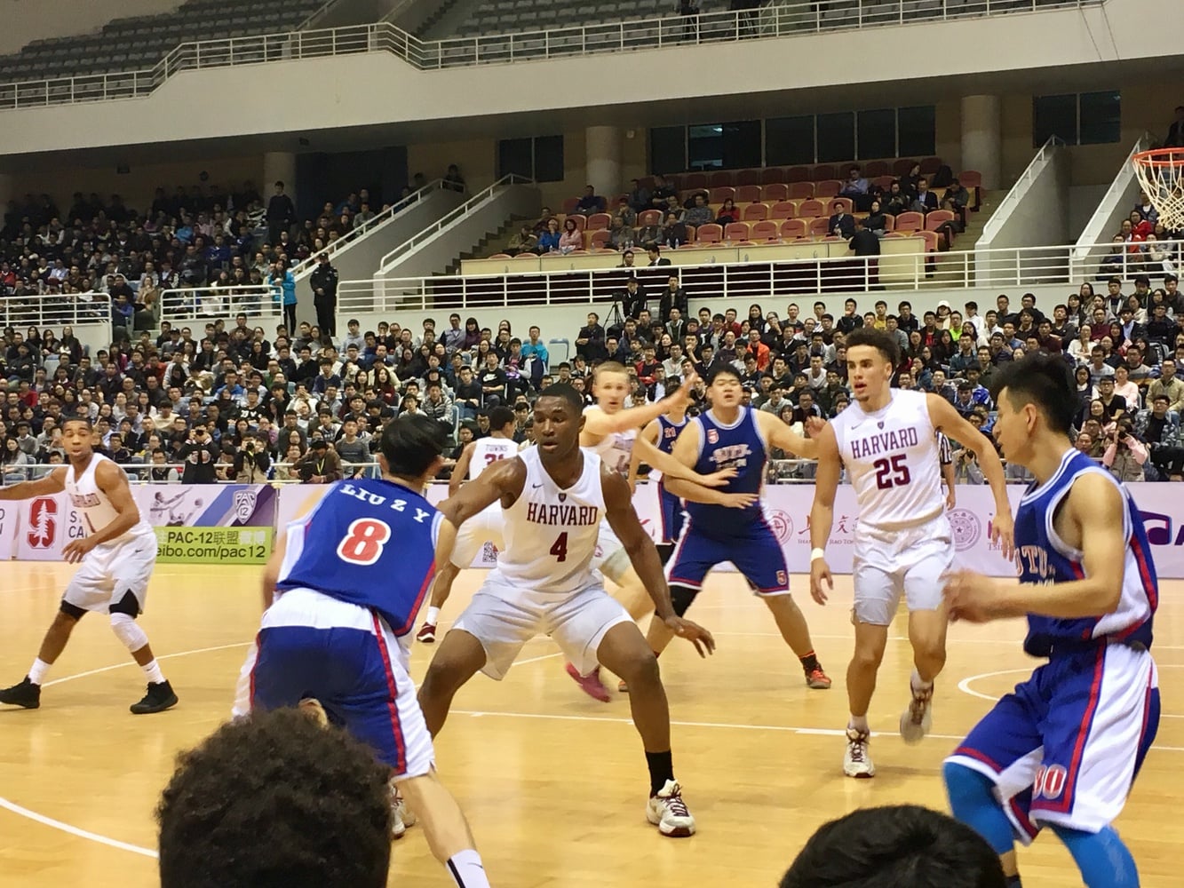 In its first round of action in Shanghai, the Crimson took on Shanghai Jiao Tong University in the 5th Annual U.S.-China Men’s Basketball Friendship Game as part of the Pac-12 Global Initiative. 