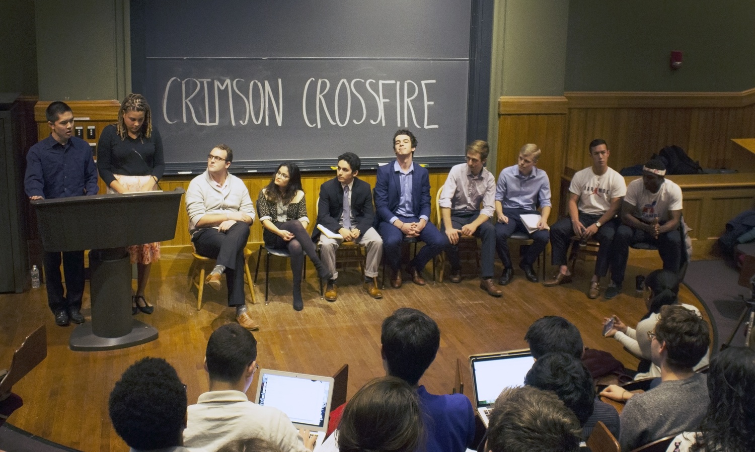 Students running for the Undergraduate Council president and vice president positions participate in a debate hosted by The Harvard Crimson reporters on Friday night. The debate, called “Crimson Crossfire,” covered topics such as sexual assault prevention and social club policies.