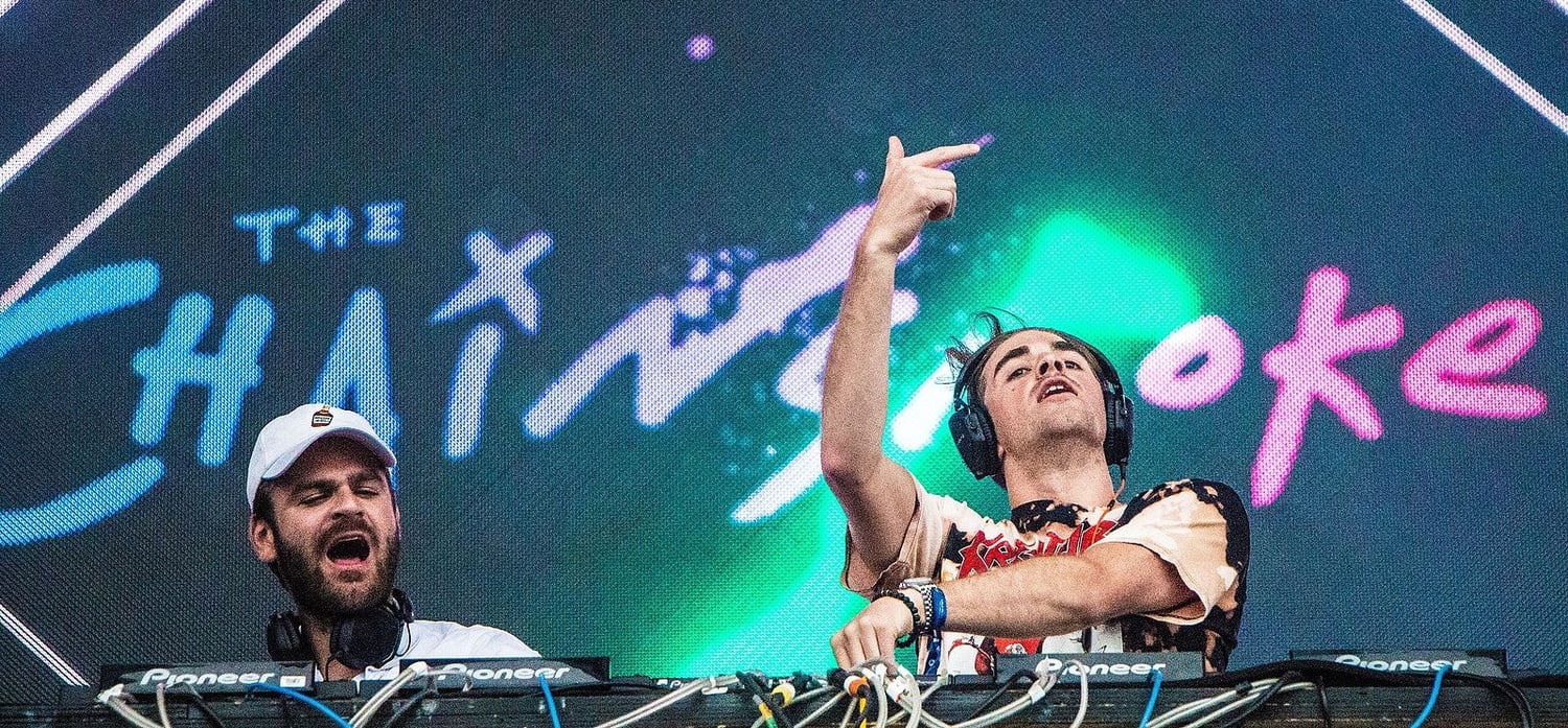 The Chainsmokers—a popular EDM duo—performs. 