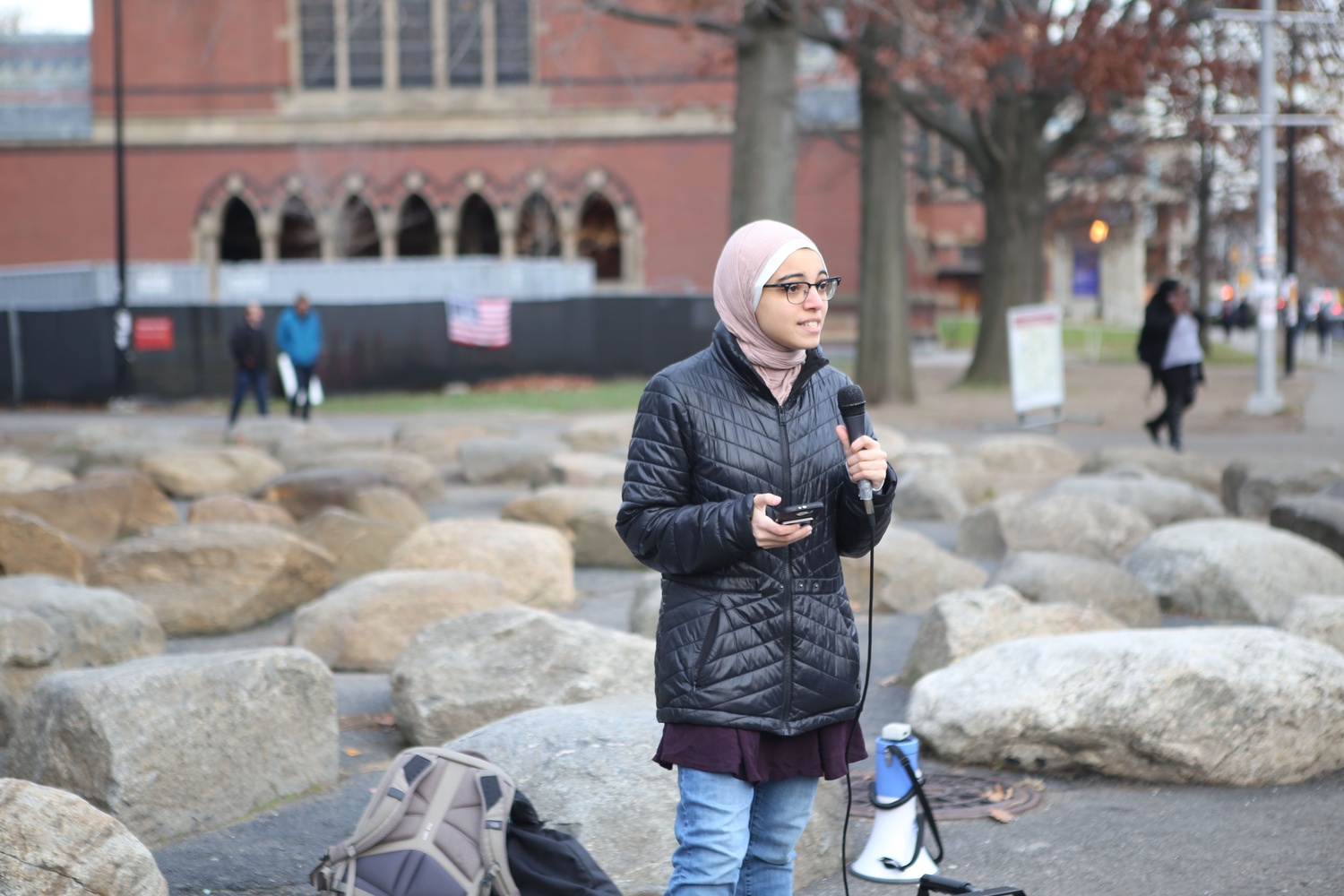 Anwar Omeish ‘19, the Director of External Relations of the Harvard Islamic Society, speaks to the crowd rallying in support of Harvard being a sanctuary campus in the Science Center Plaza. This motion was advanced by History professor Walter Johnson, who also spoke at the rally.