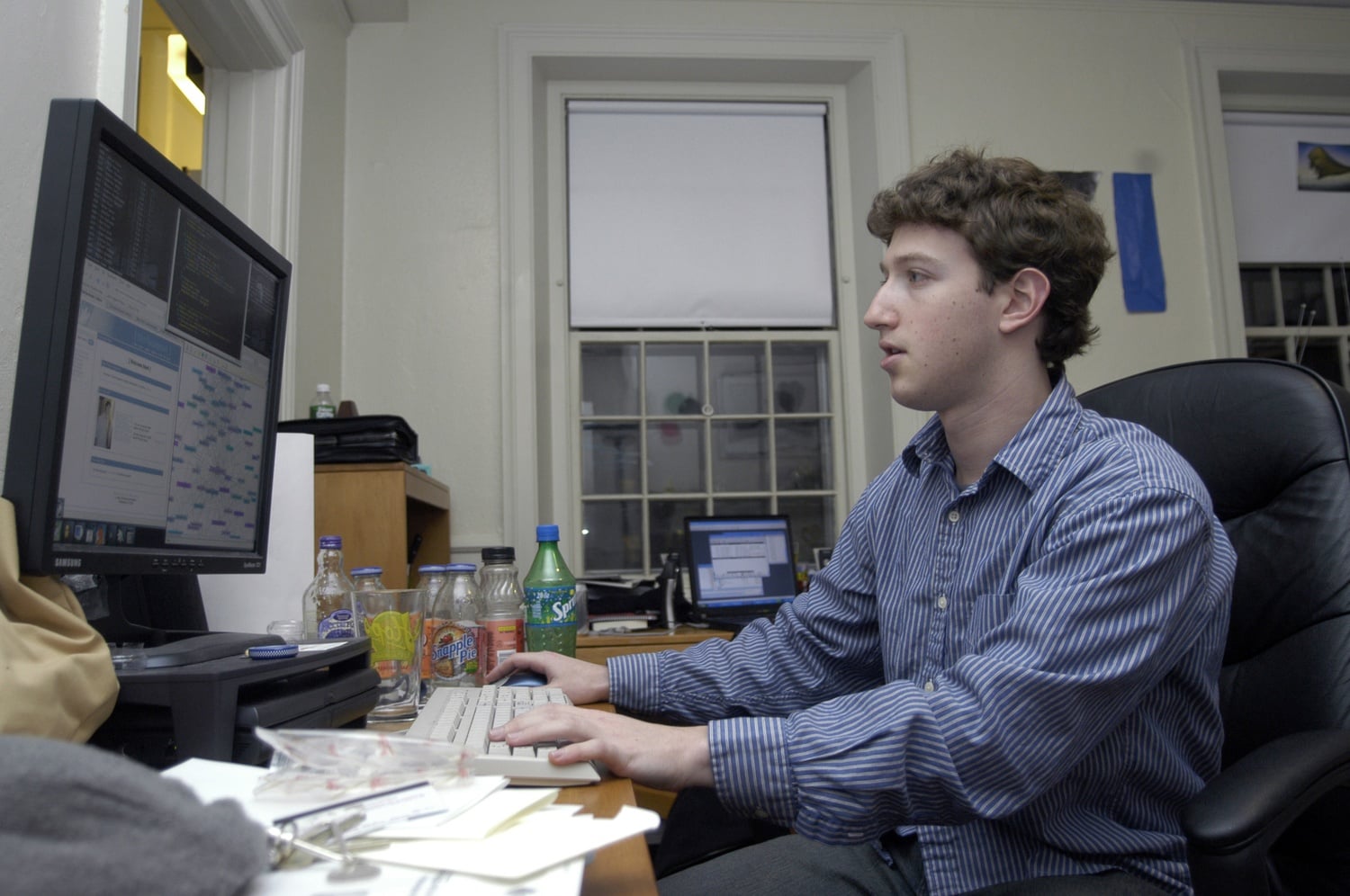 Mark Zuckerberg works in his Kirkland dorm room in 2004, following the launch of thefacebook.com. 
