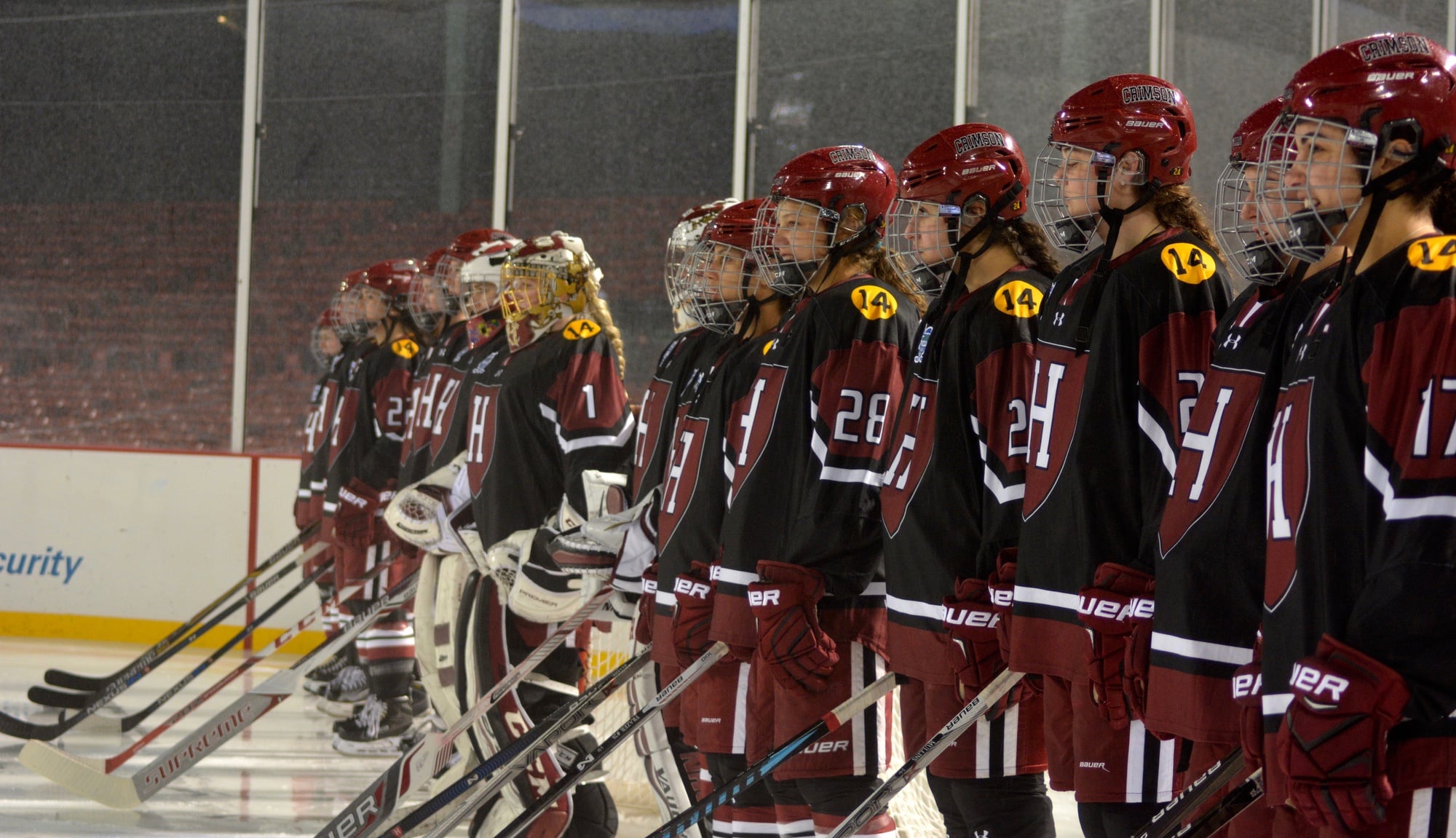 The Crimson lines up along the goal line prior to puck drop.