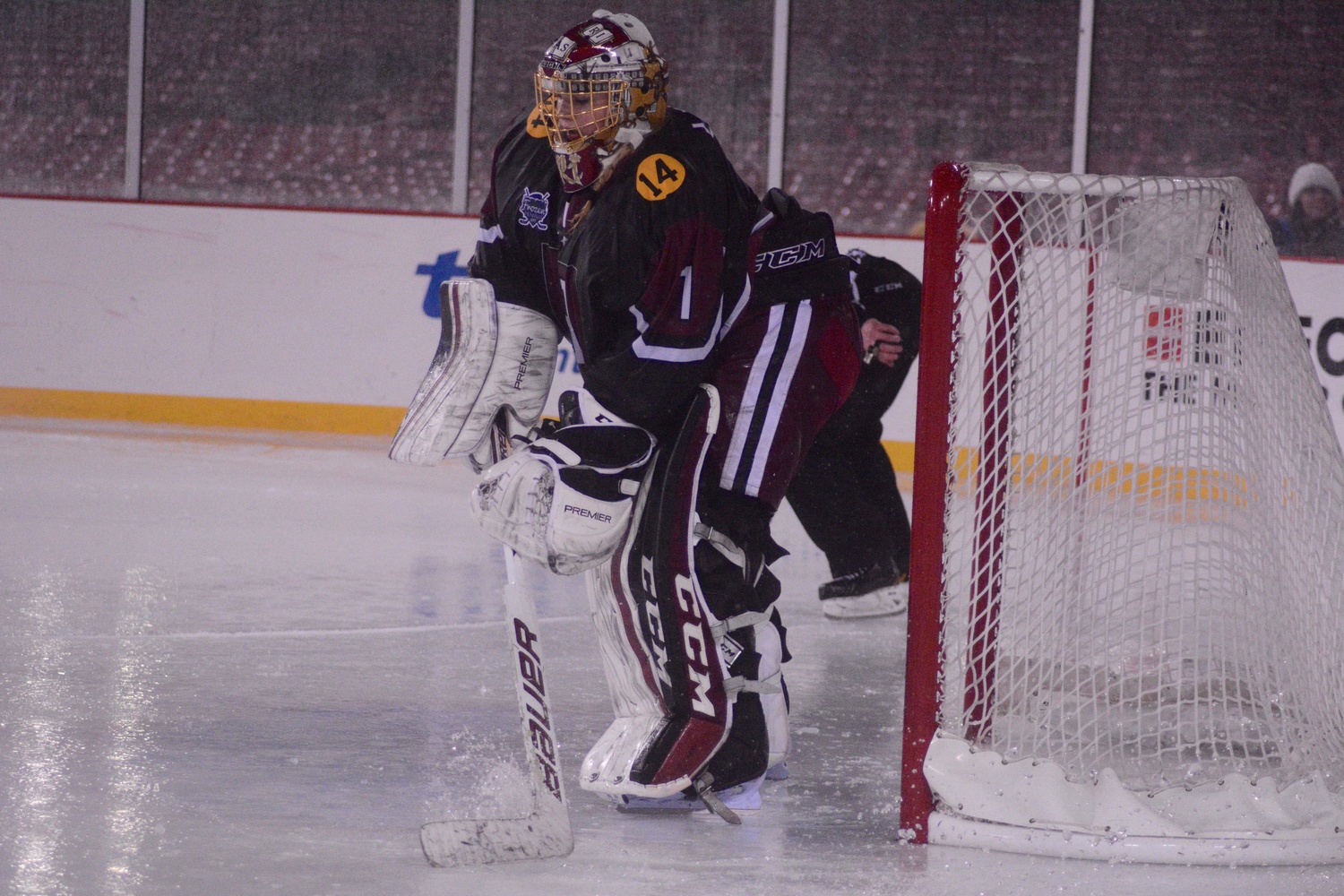 Harvard goaltender Brianna Laing spent several stoppages of play sweeping water out of her crease and the surrounding area during the third period.