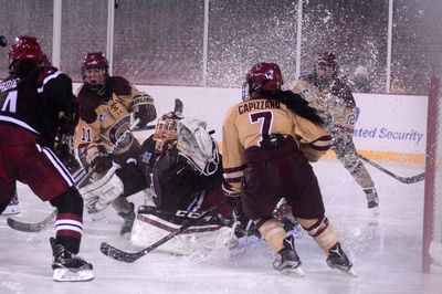 Cover image for Amid Adverse Conditions, Women's Ice Hockey Drops Frozen Fenway Game to Boston College