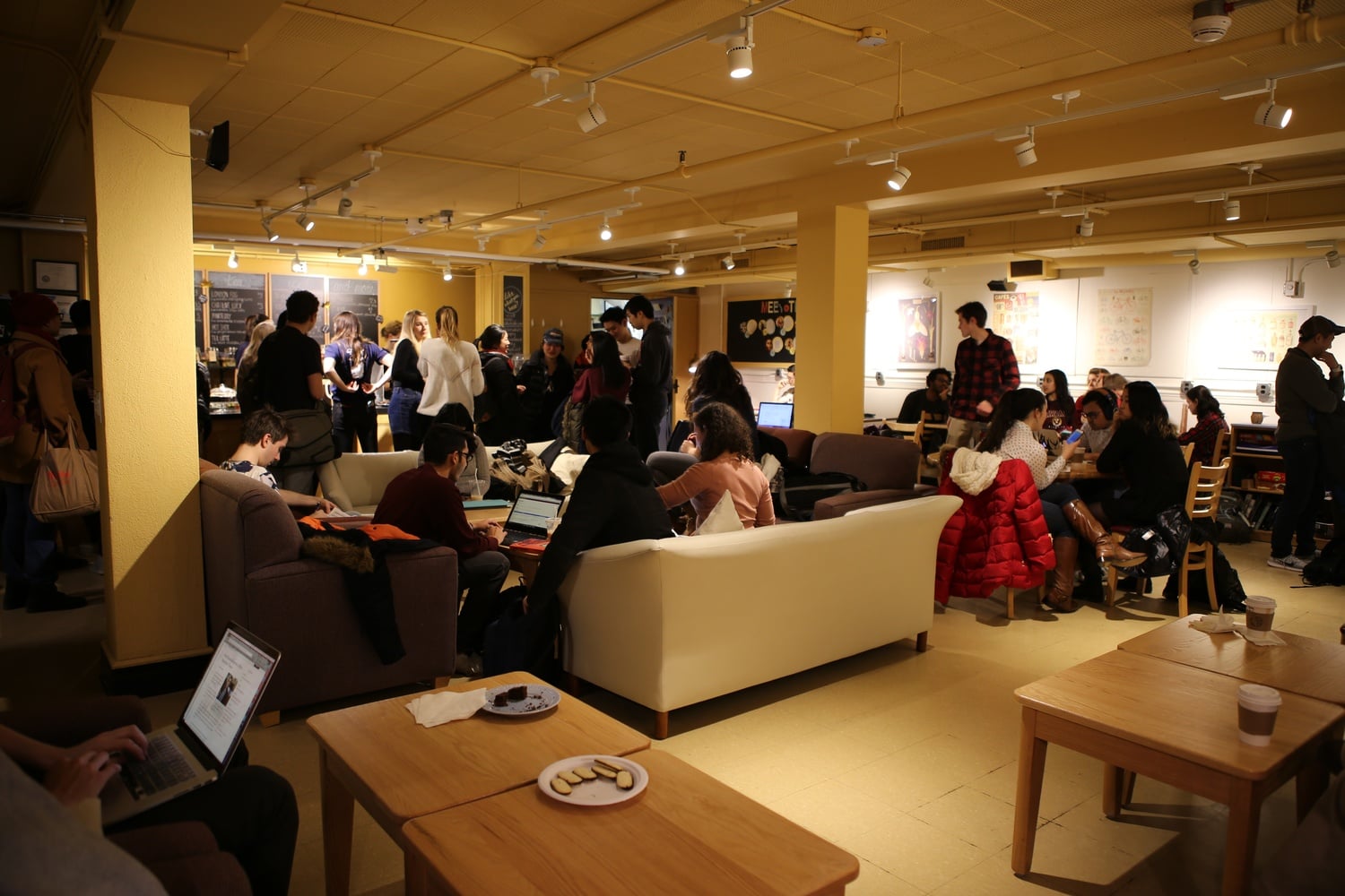 Students gather for Cabot Cafe’s housewarming, enjoying brownies, cookies, and drinks on Sunday night.