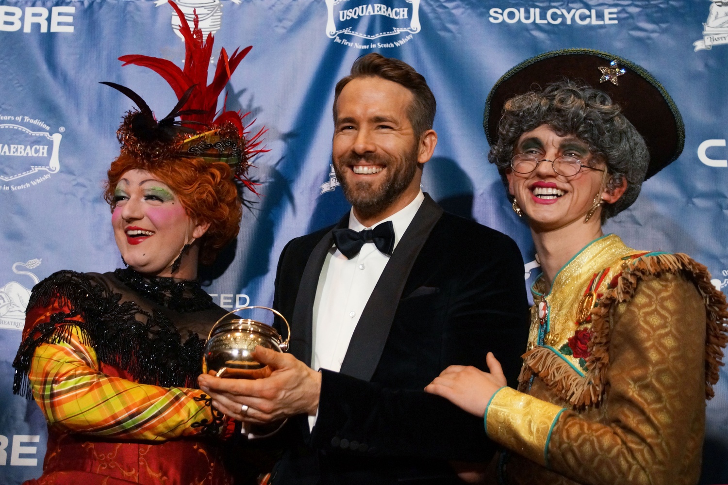 Hasty Pudding Man of the Year, Ryan Reynolds, poses with Hasty Pudding Theatricals cast members. Reynolds was presented with the Pudding Pot Friday evening. 