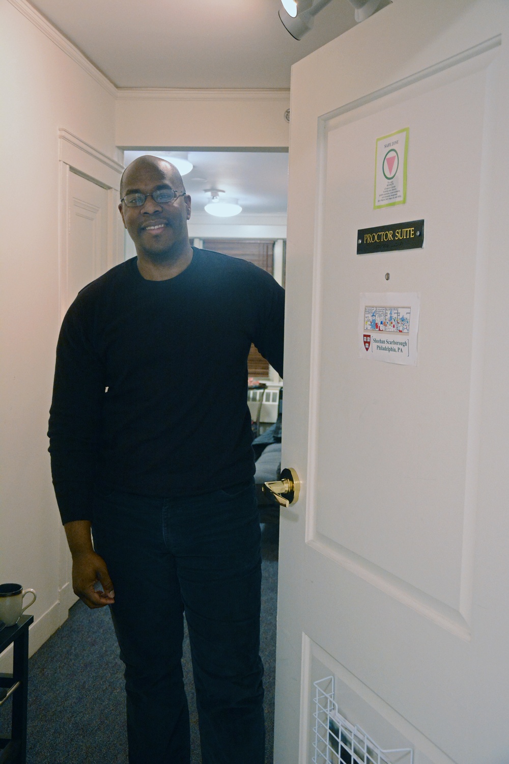 Scarborough at the door of his suite in Pennypacker, where works as a proctor. Over the seven years he has been a proctor, Scarborough has earned a reputation for being thoughtful and caring.