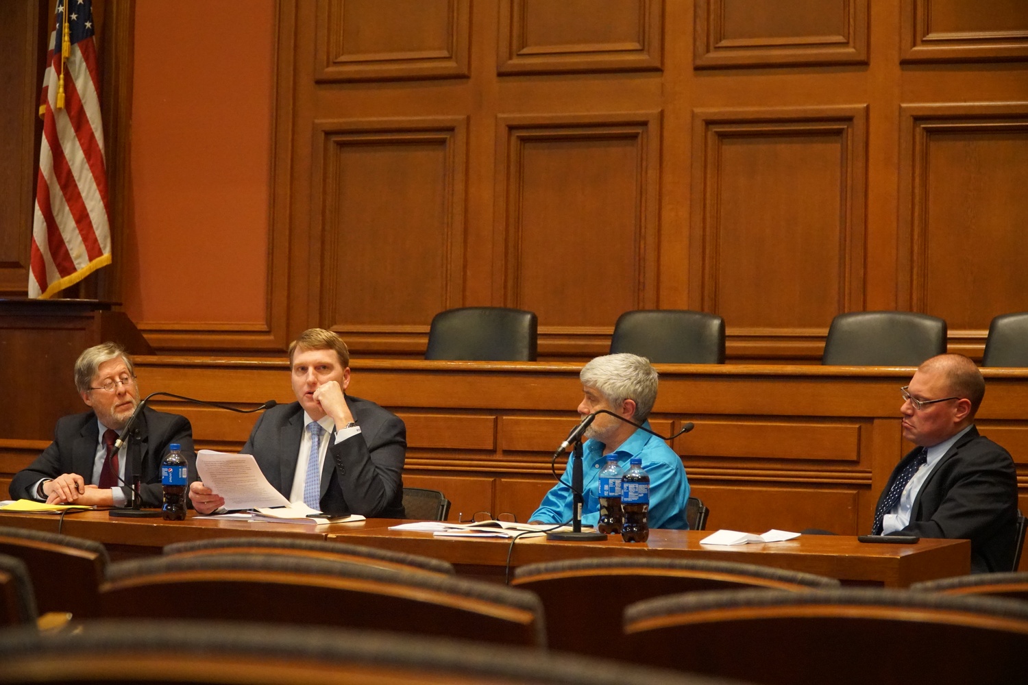 Brent Booker, Larry Beeferman and other two panelists discussed labor and the wider political economy during the Trump era at Harvard Law School on Tuesday night.