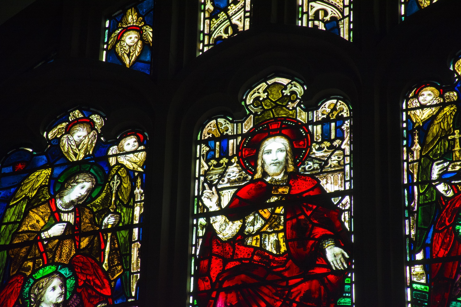 Stained glass windows adorn the walls of Andover Chapel, which occupies the southern half of Andover Hall's second floor. 