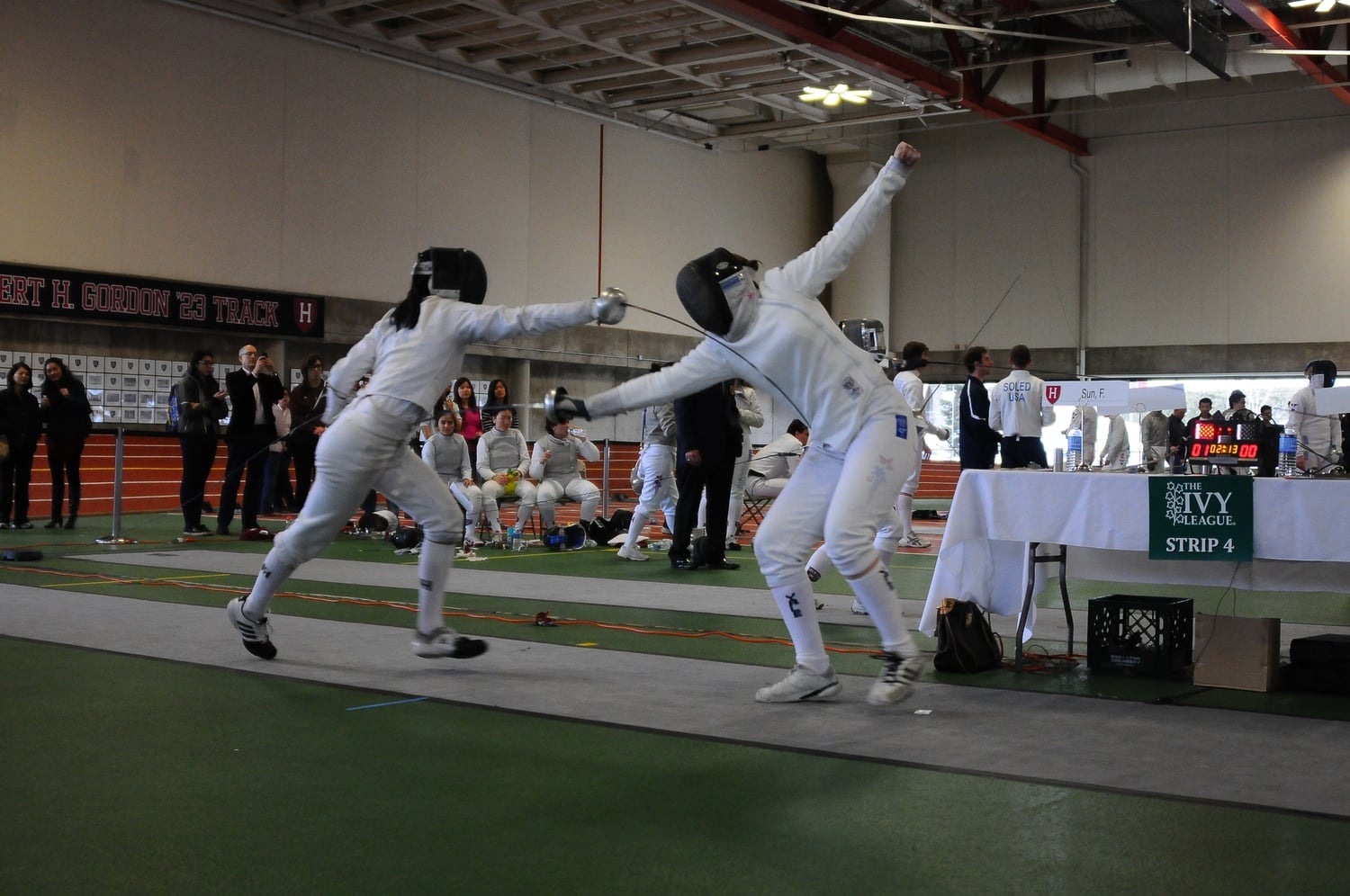 Harvard's men's and women's fencing teams sliced through the competition en route to a 10th straight Beanpot victory.