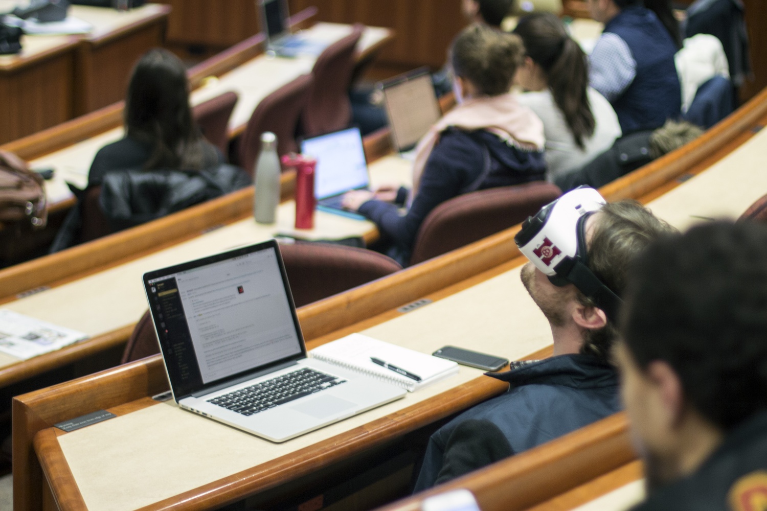 A student at an event hosted by Harvard AR/VR Student Alliance tries on a virtual reality headset. The event was hosted in conjunction with Harvard Business School’s CODE student organization and featured HBS alum Richard Dulude. 