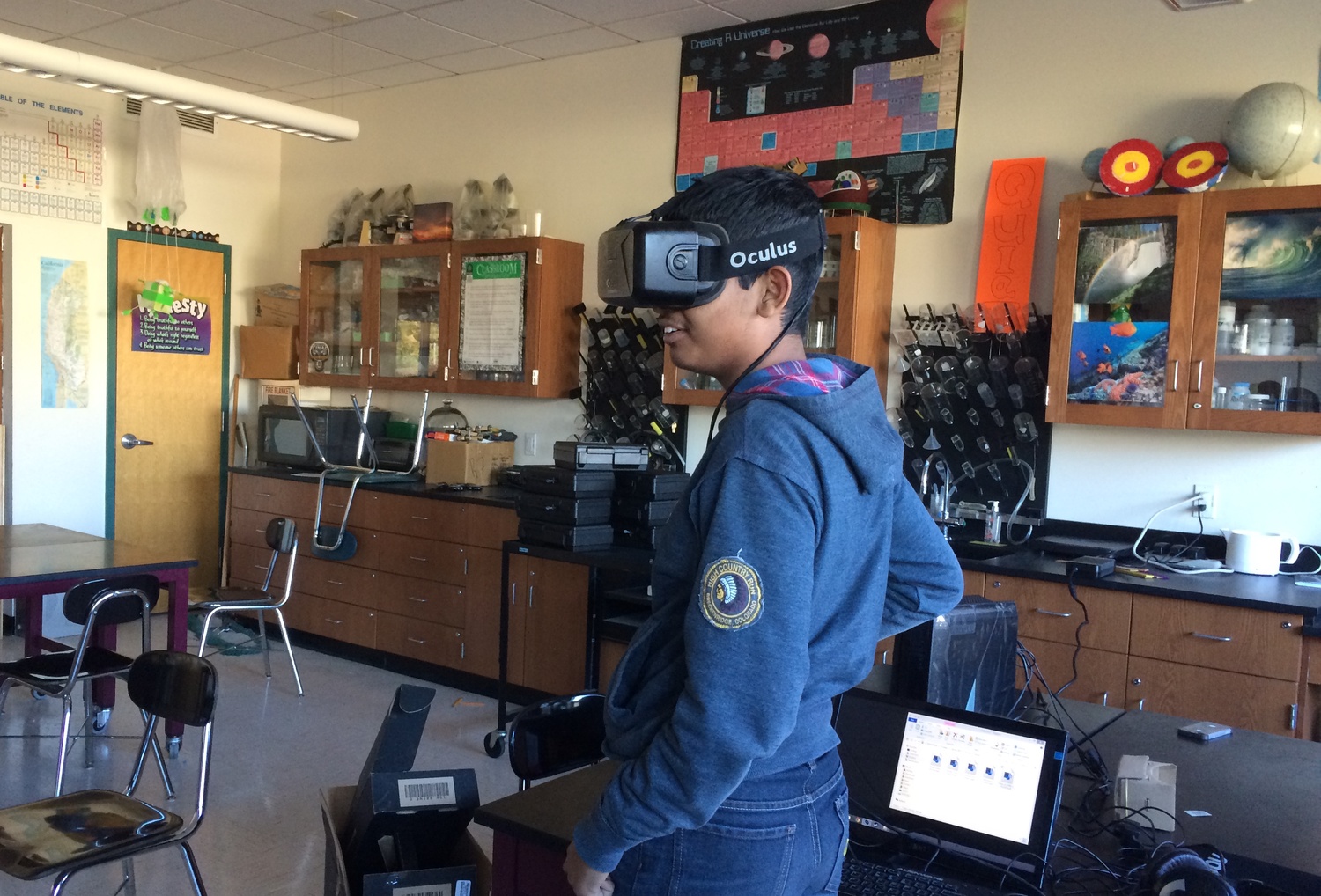 A student tries on a virtual reality headset, as a part of Dreamporte. Dreamporte is a student group at Harvard that aims to bring virtual reality into classrooms at middle schools.