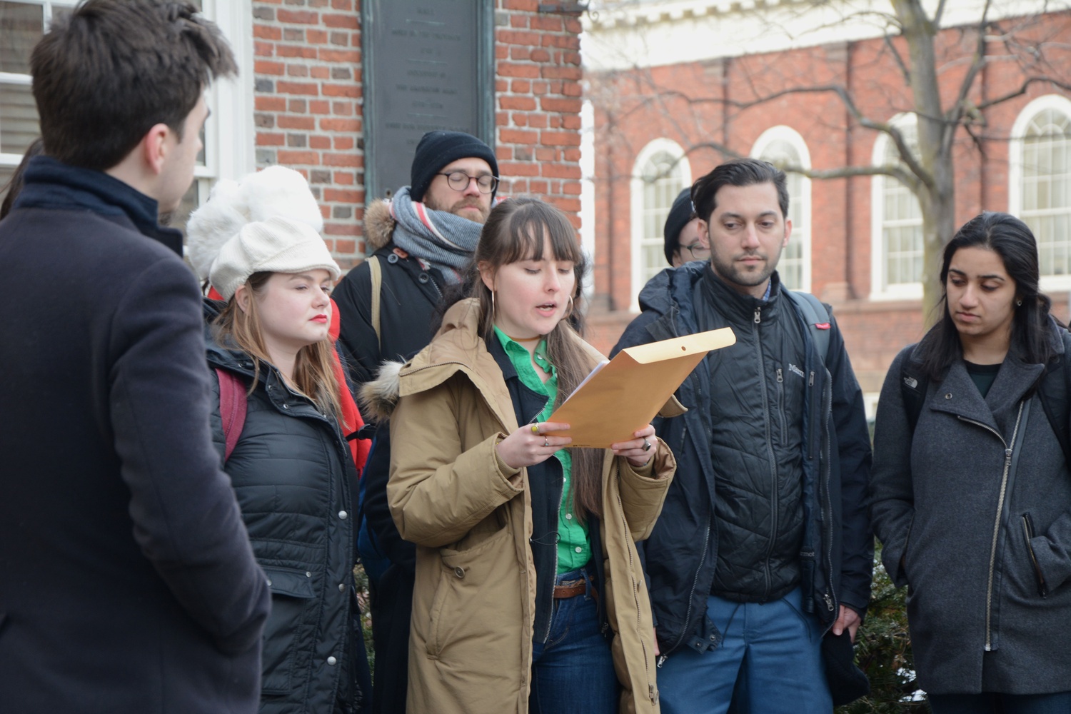 The International Scholars Working Group, part of HGSU-UAW, presented University President Drew G. Faust with a petition calling for increased support for immigrants earlier this year.