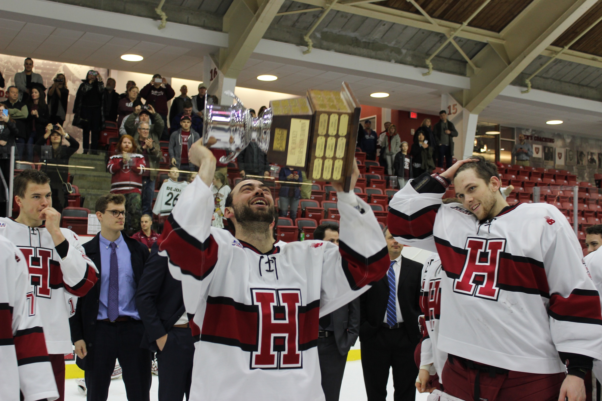 Senior Luke Esposito celebrates with the stand-in Cleary Cup.