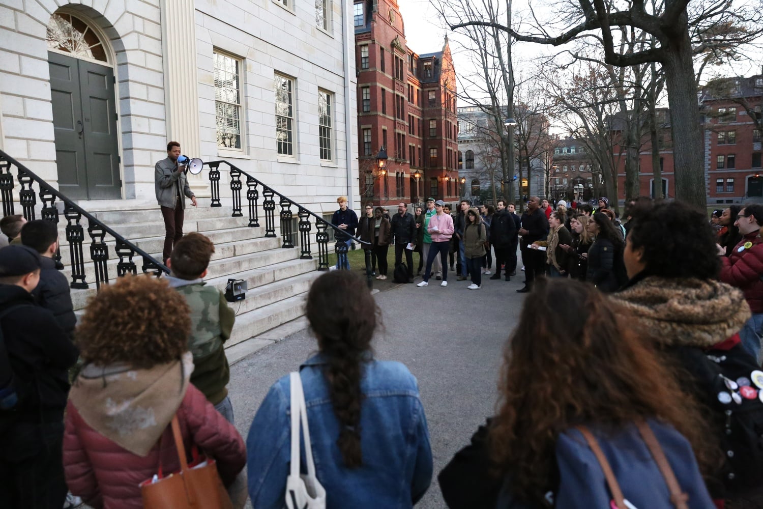 Jonathan S. Roberts ‘17 speaks during the Trans Rights Rally on Monday outside of Mass. Hall. The rally protested Trump administration’s decision to remove federal protection for transgender students, and called for Harvard’s support.