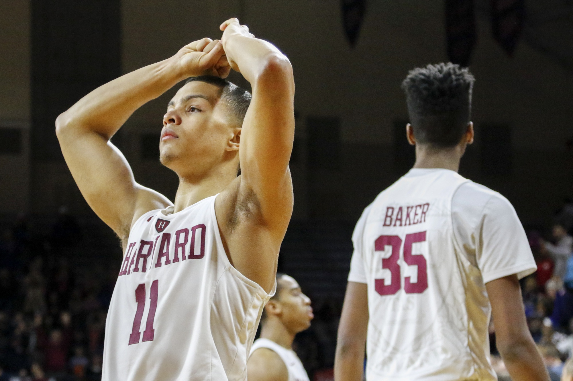 Freshman point guard Bryce Aiken reacts after Penn sophomore guard Jackson Donahue hit a late three to lift Penn past Harvard, 75-72. 