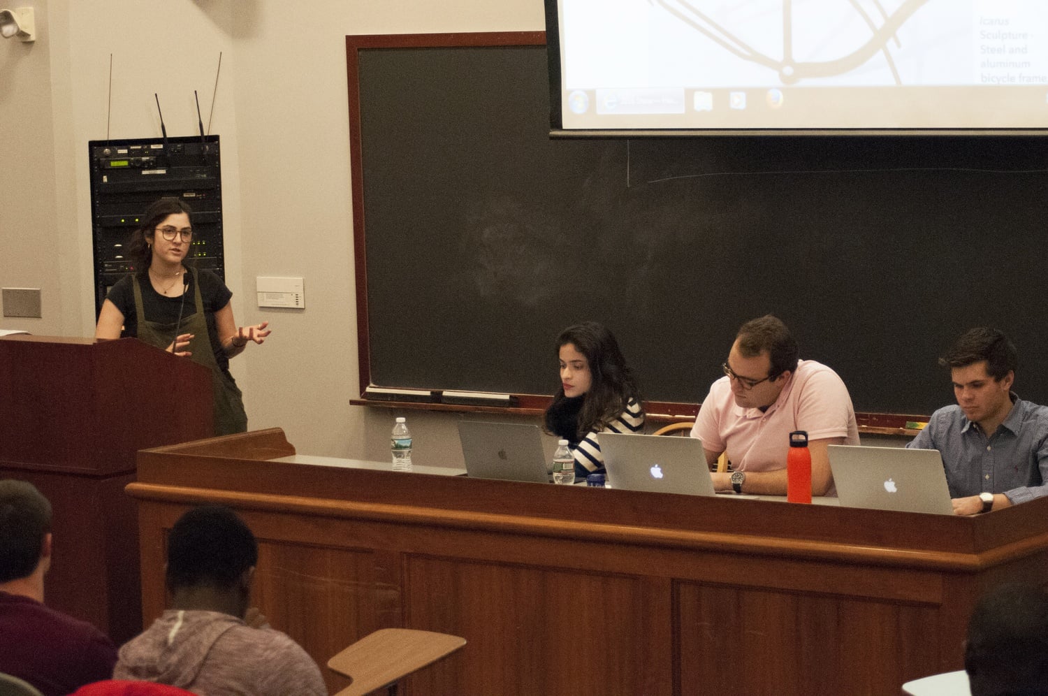 Eloise A. Lynton '17, Co-Director of the Harvard Student Art Show, speaks to the Undergraduate Council on Sunday evening about how the UC can support the 9th annual show opening on April 1. 