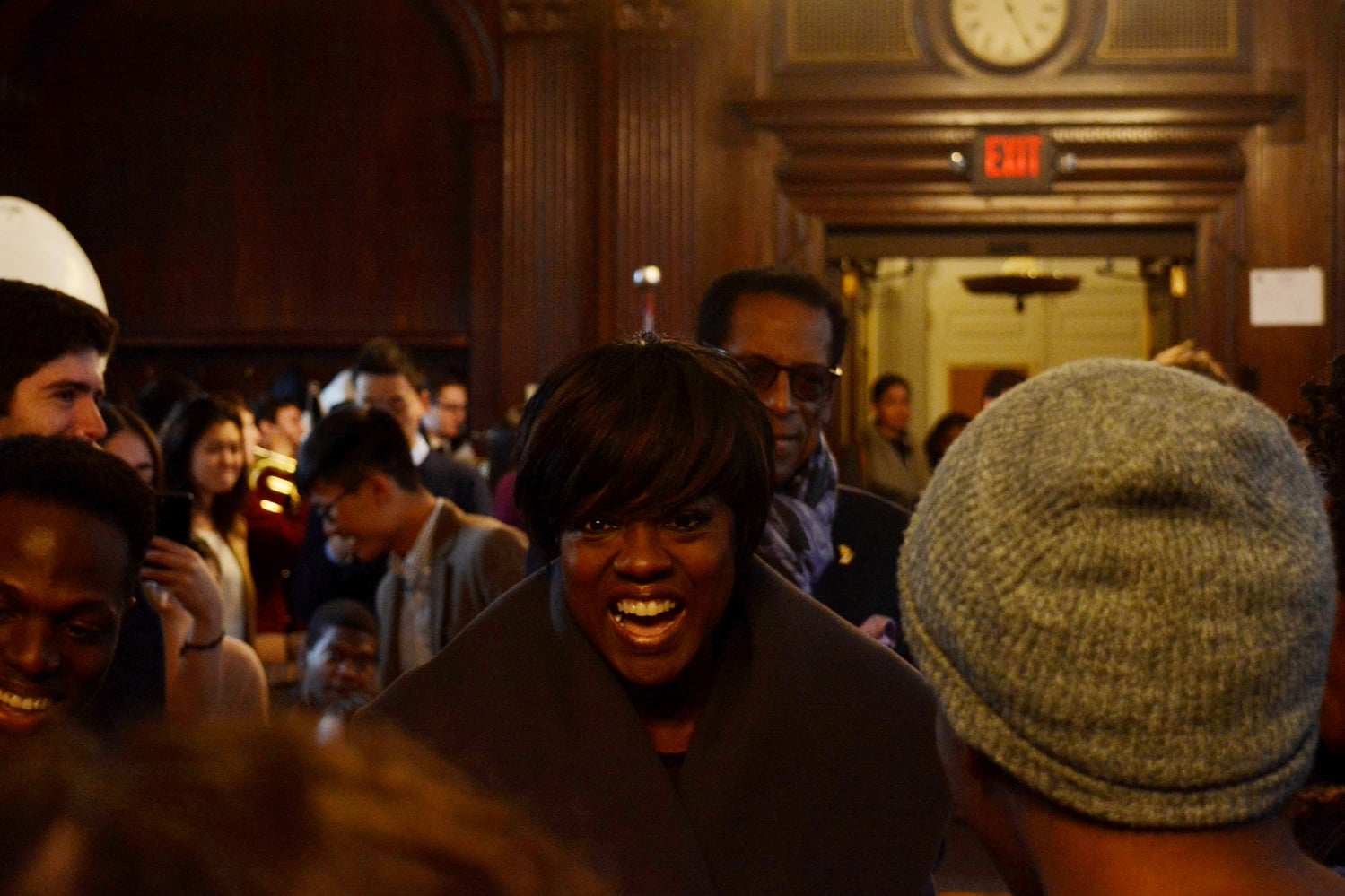 Harvard Foundation’s 2017 Artist of the Year Viola Davis celebrates with Harvard students before a lotteried luncheon in Kirkland House. The celebration took place in Kirkland House’s Junior Common Room and included performances from various student groups, including a roast by Immediate Gratification Players.