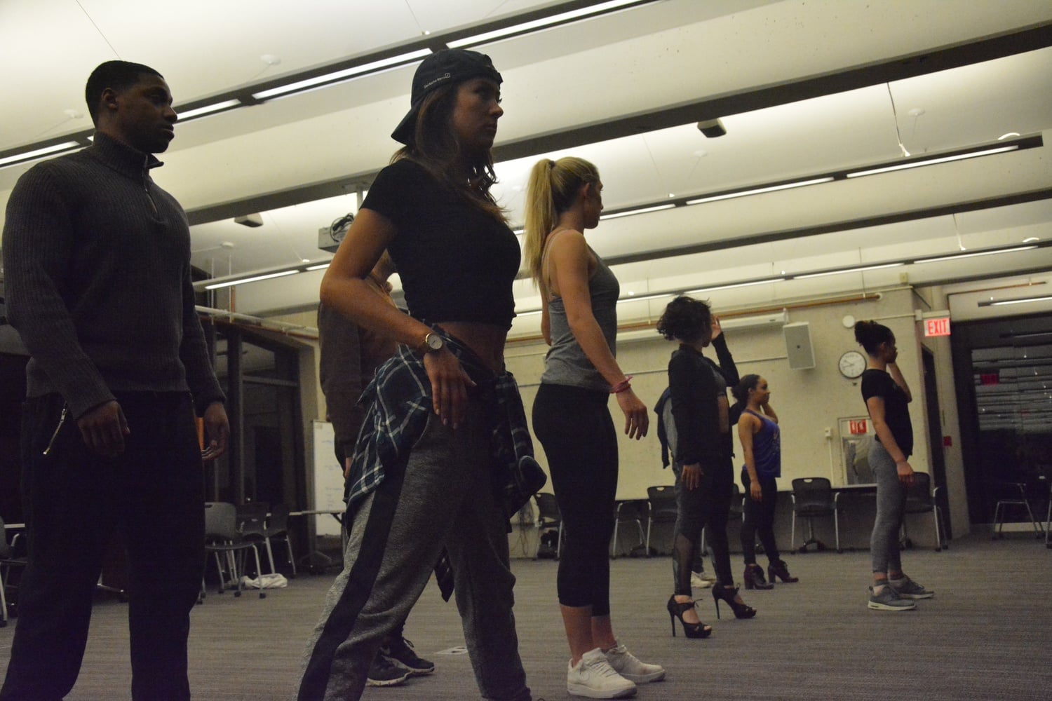 Students rehearse for the Eleganza fashion and dance show in the SOCH. 