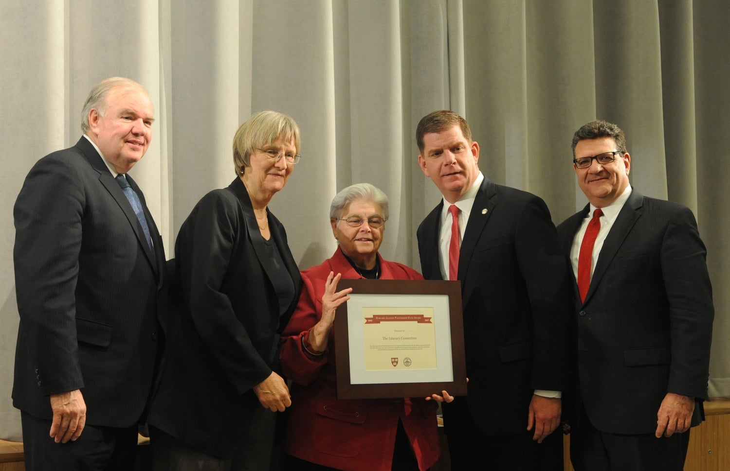 University President Drew G. Faust and Boston Mayor Martin J. Walsh award funding for the 9th Annual Harvard Allston Partnership in an effort to support Allston-Brighton residents. 
