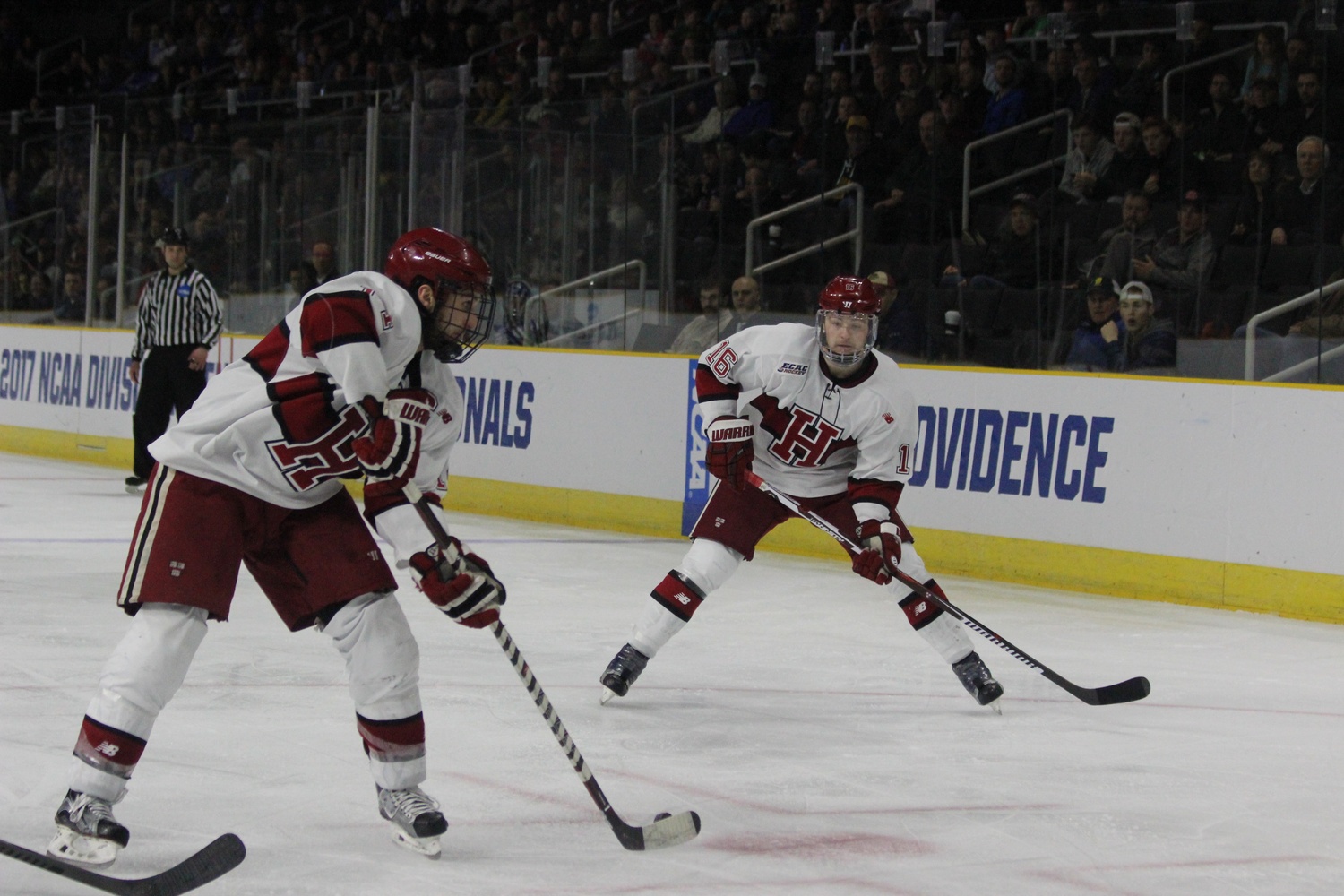 Approaching the Air Force goal, senior forward Alex Kerfoot looks to pass to teammate Ryan Donato. Kerfoot would finish the night with two assists, Donato with a goal.