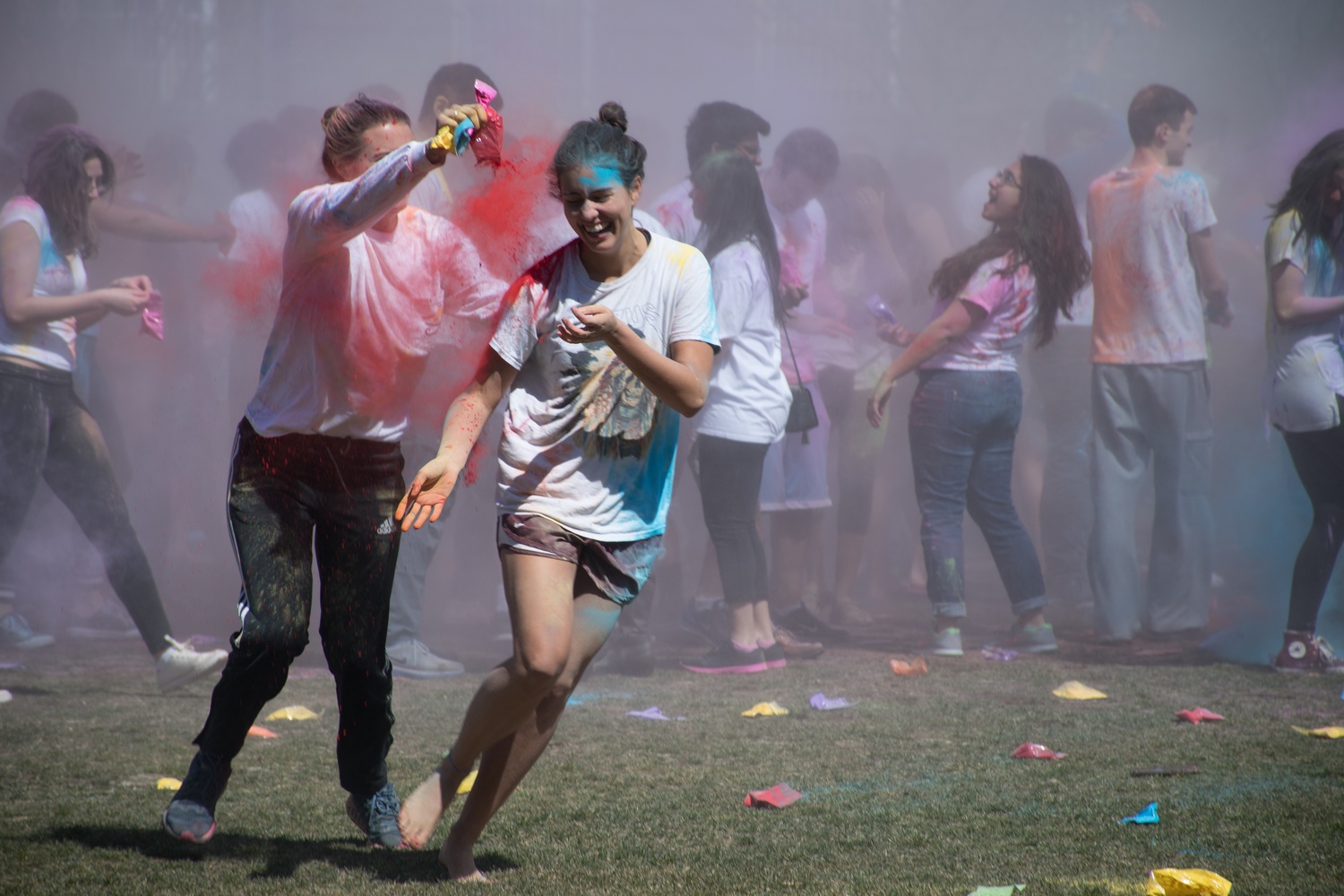 Sophie C. Altchek ‘17 throws paint powder on Zoe G. Foulkes ‘17 during the Holi Festival on Sunday afternoon.  Harvard Dharma and the Harvard India Student Group organized the traditional paint-throwing celebration, which marks the end of winter and arrival of spring.