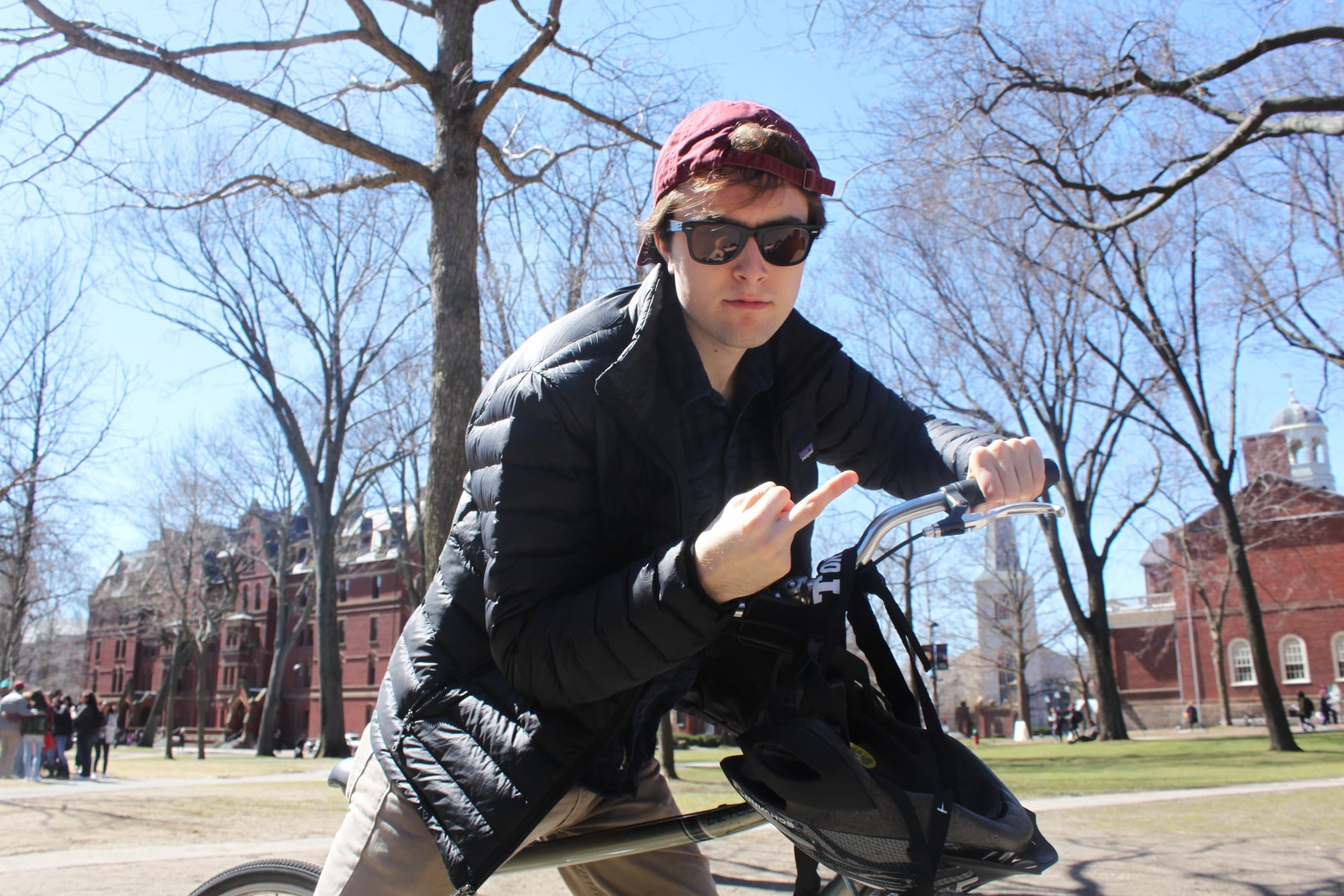 Drew C. Pendergrass rides his bike through the yard. Haters can hate, but he doesn't care. 