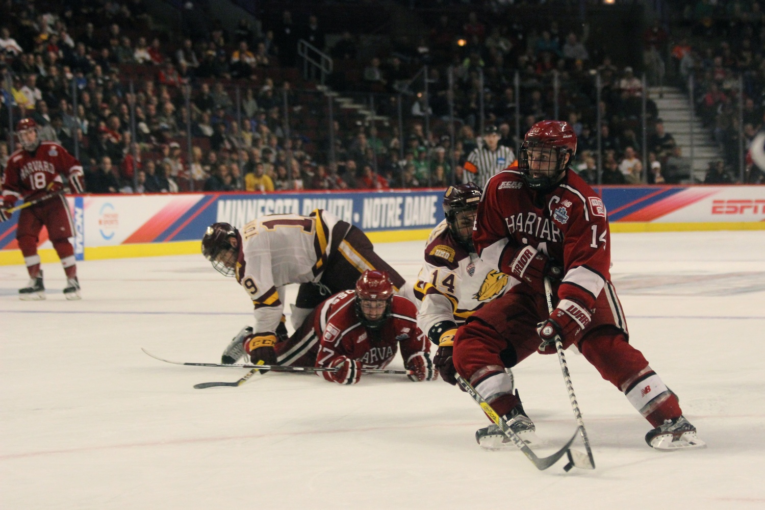 Senior forward Alexander Kerfoot escapes the Minnesota-Duluth defense.