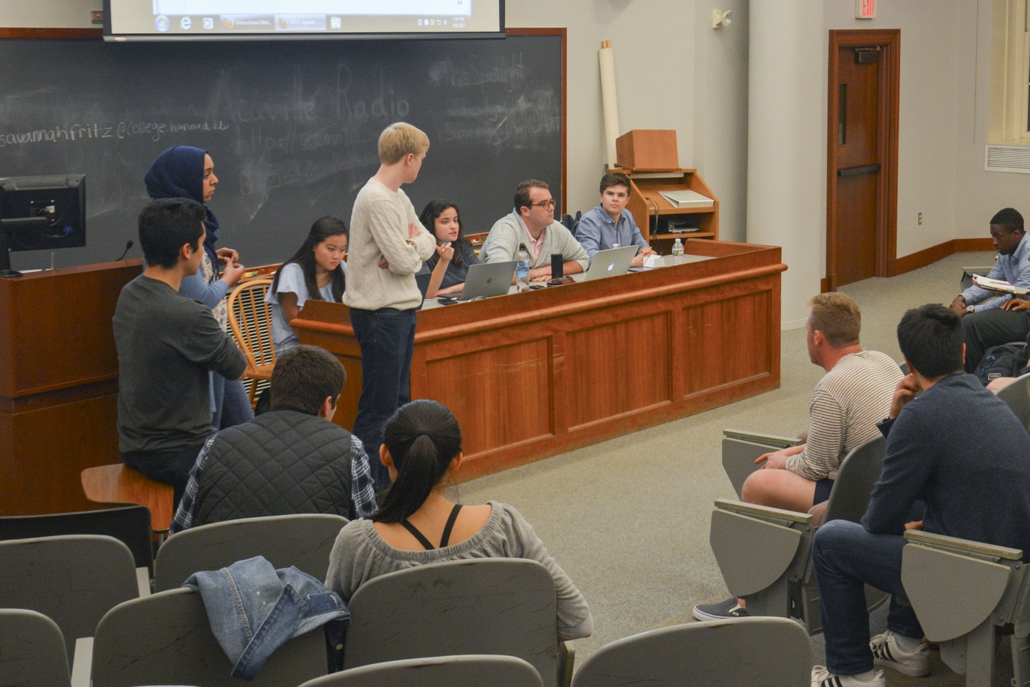 Eduardo A. Gonzalez ‘18, Salma Abdelrahman ’20 and Evan M. Bonsall ’19 present a letter condemning Dean of the College Rakesh Khurana’s rejection of the proposal for a summer bridge program for low-income students at the Undergraduate Council meeting on Sunday evening.
